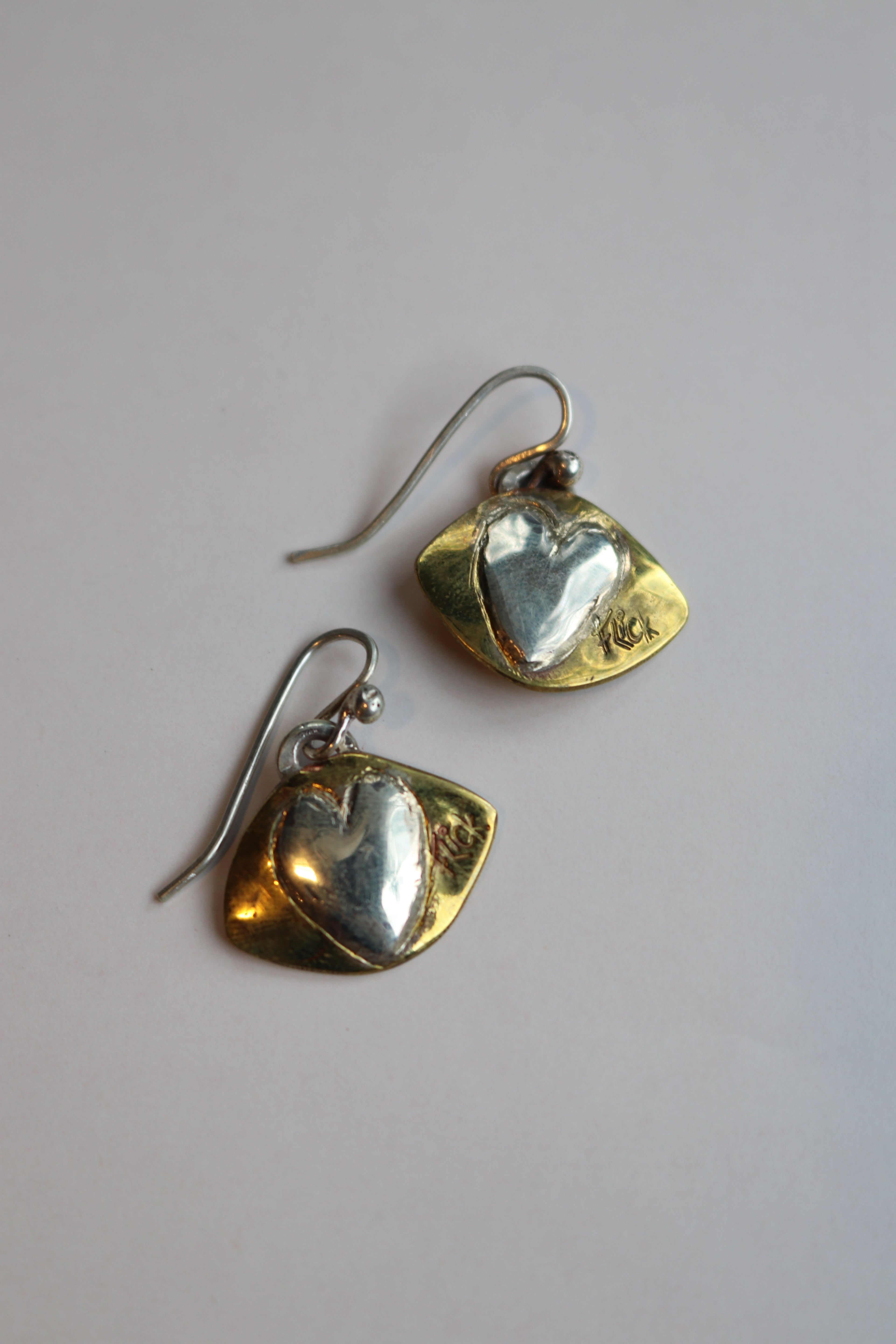 Brass and silver shield earrings